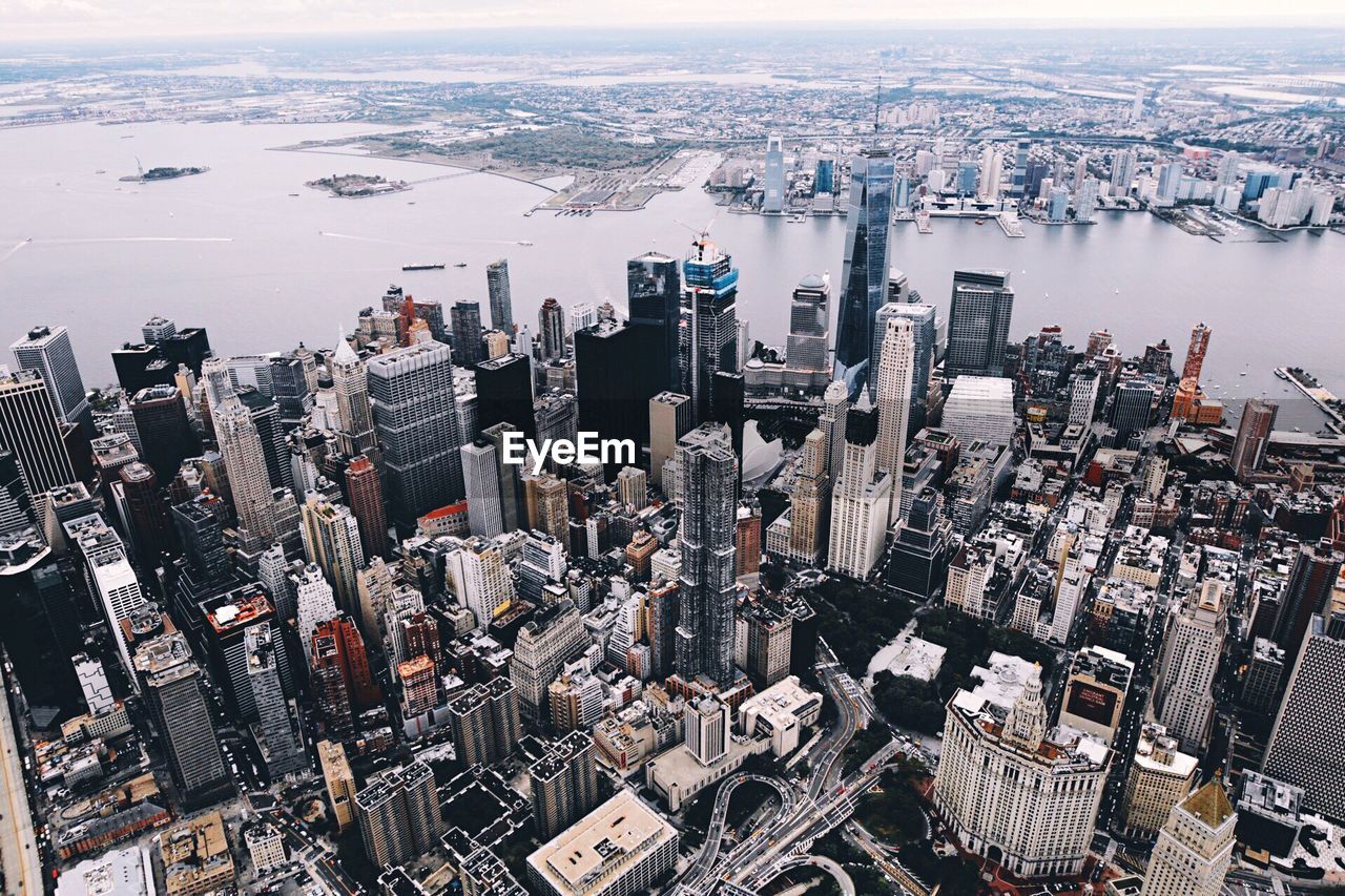 High angle view of one world trade center in city by river