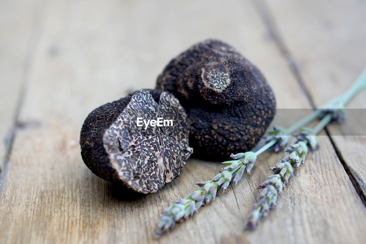 wood, food, food and drink, healthy eating, no people, table, close-up, wellbeing, freshness, indoors, studio shot, still life, bead, jewellery, fruit, selective focus, produce, edible mushroom, fashion accessory