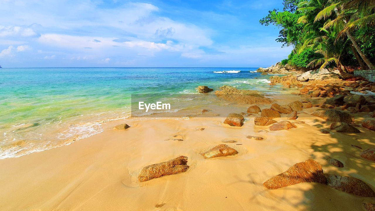 Scenic view of beach against sky