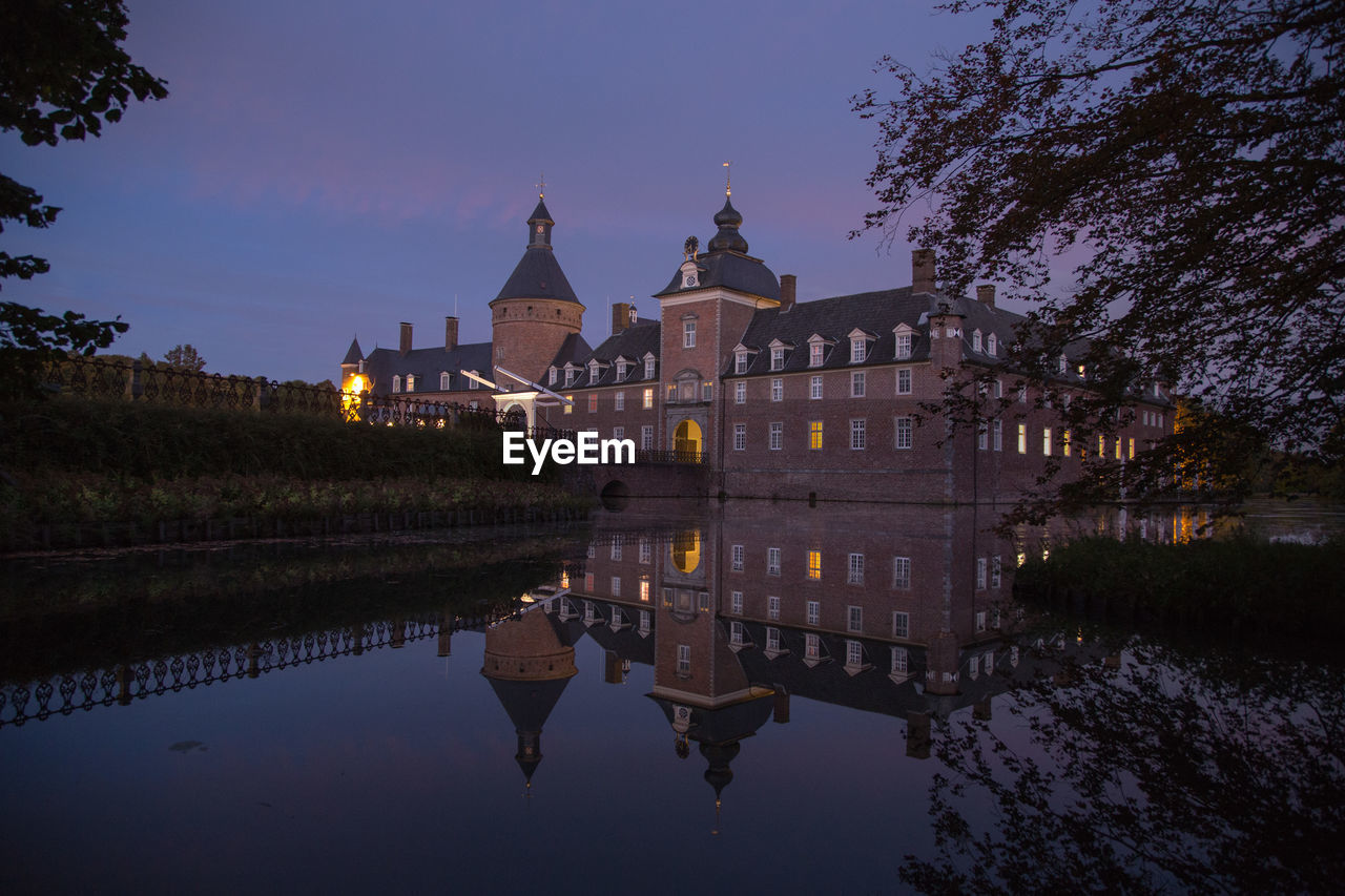 REFLECTION OF BUILDINGS IN WATER