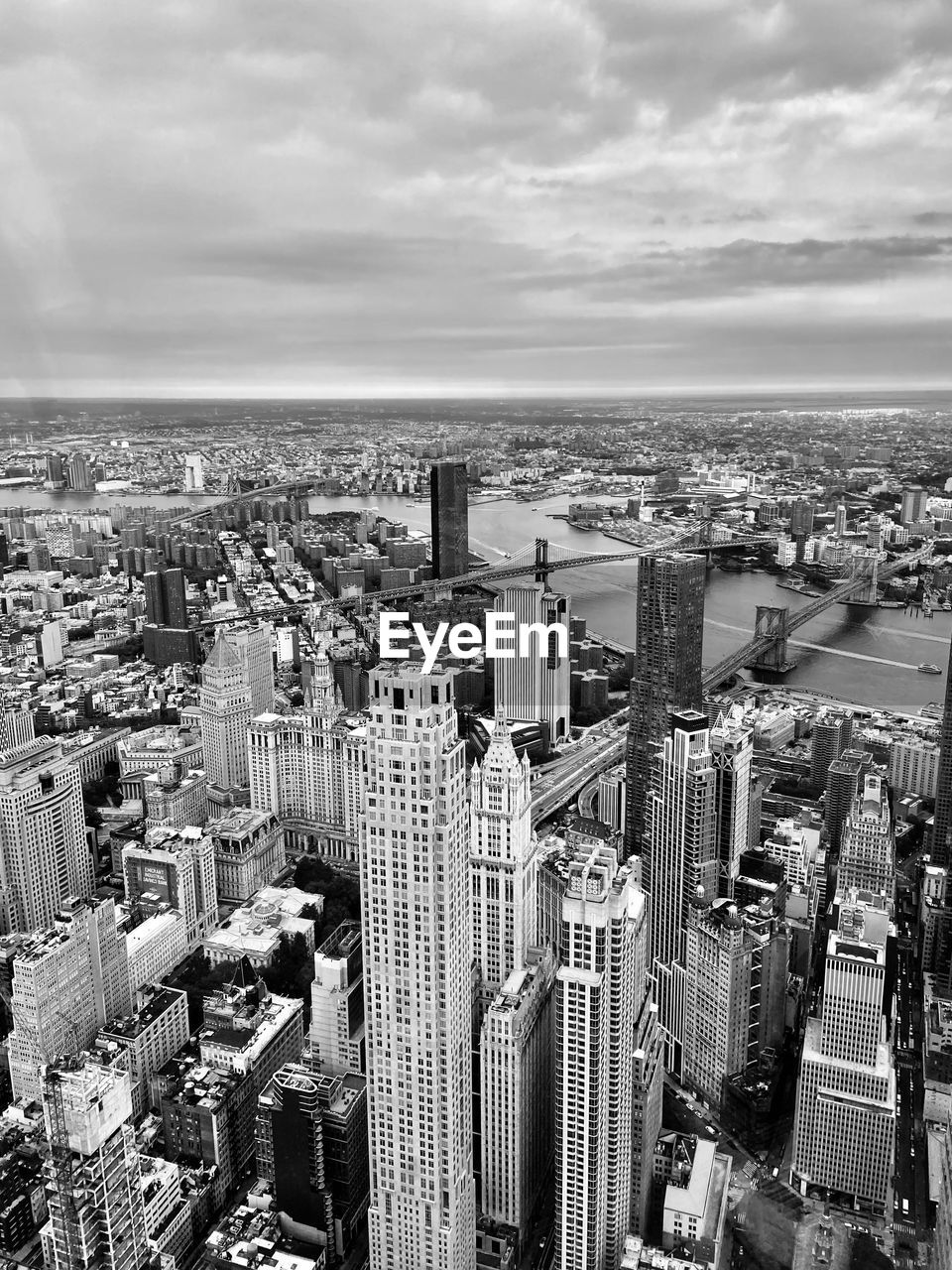 city, architecture, cityscape, building exterior, black and white, built structure, metropolis, sky, building, urban area, monochrome photography, metropolitan area, skyline, landscape, monochrome, urban skyline, office building exterior, skyscraper, high angle view, travel destinations, cloud, nature, aerial photography, crowd, residential district, tower block, aerial view, crowded, horizon, travel, residential area, downtown, city life, tower, outdoors, water, day, tourism, sea, downtown district, neighbourhood, office