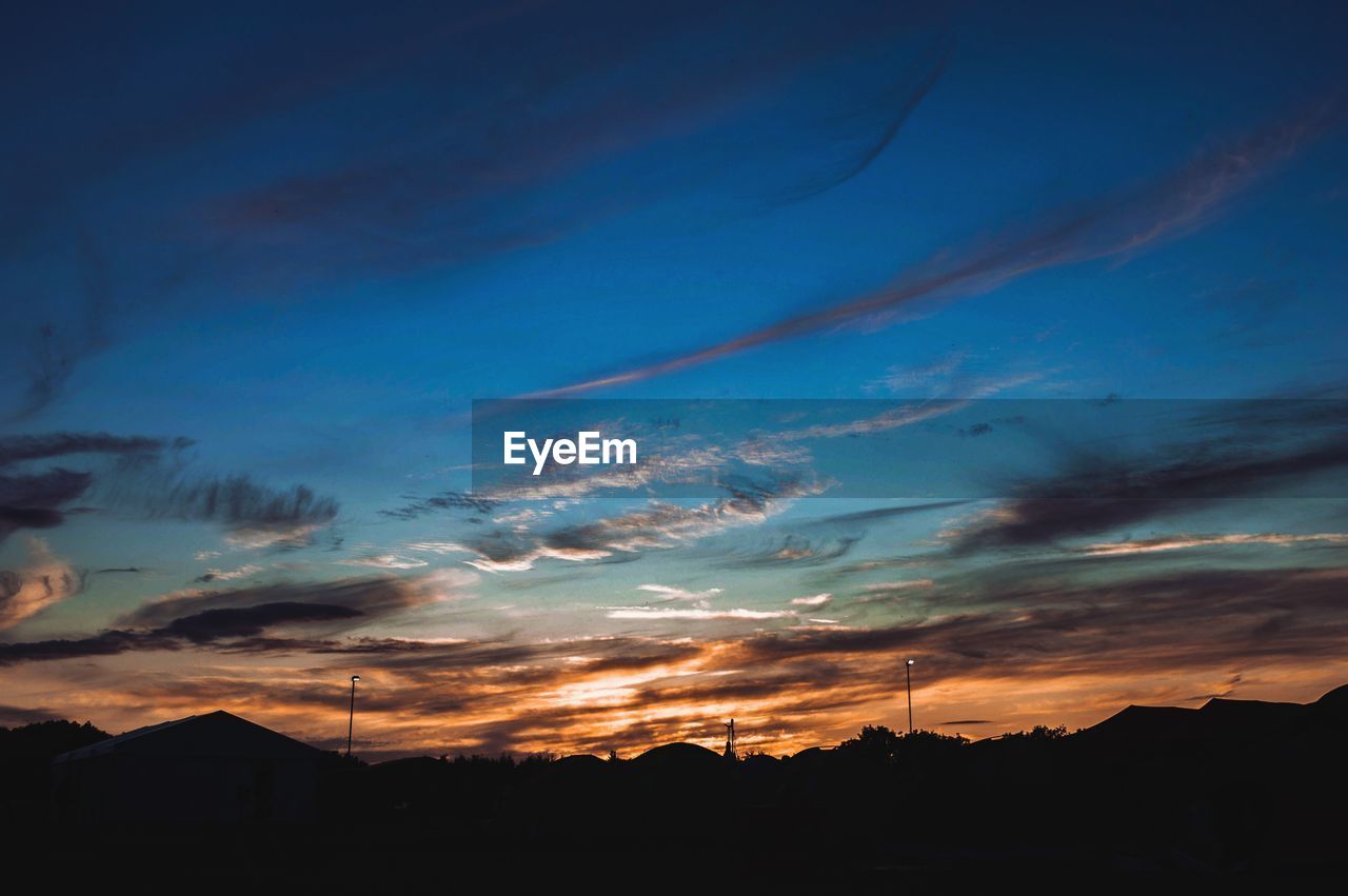 Scenic view of dramatic sky during sunset