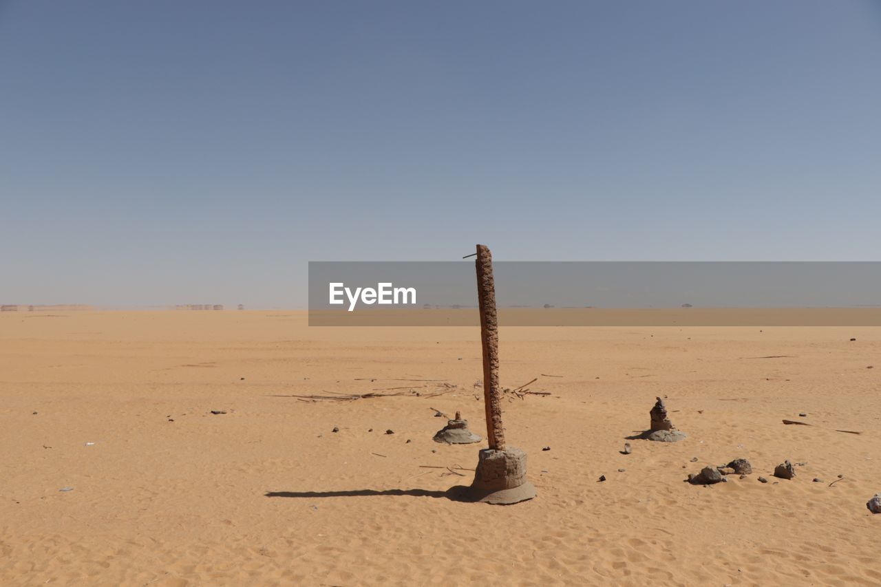 Scenic view of desert against clear sky