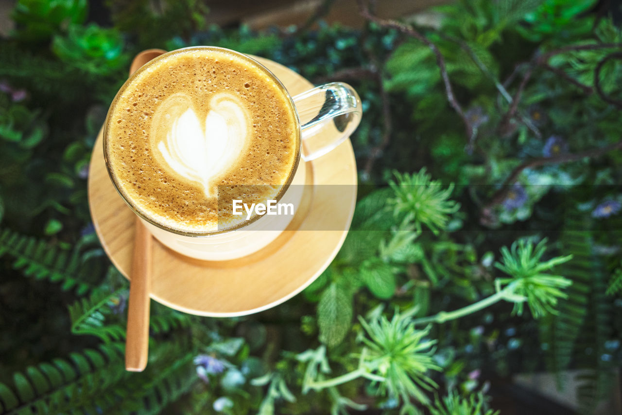 HIGH ANGLE VIEW OF COFFEE CUP WITH CAPPUCCINO