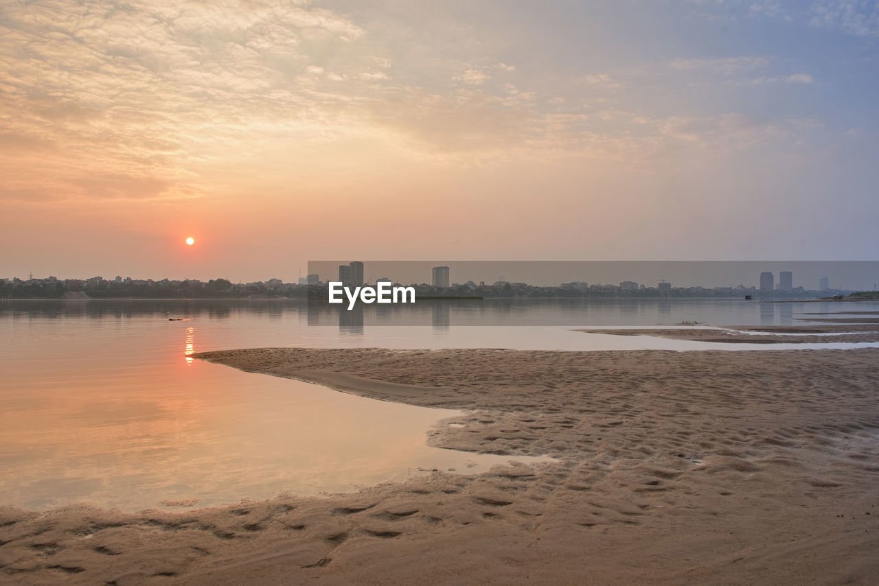 Scenic view of sea against sky during sunset