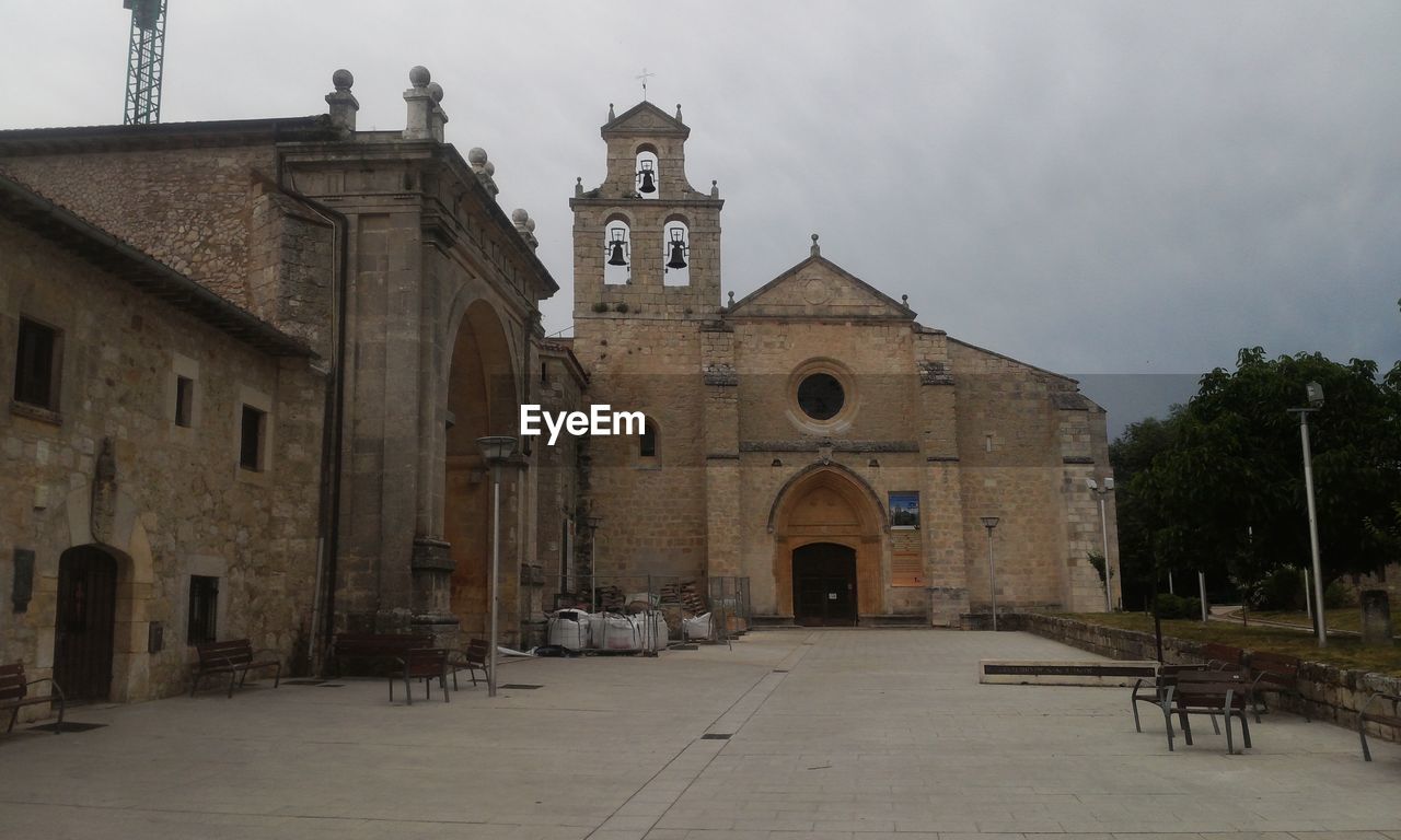 FACADE OF CHURCH AGAINST SKY