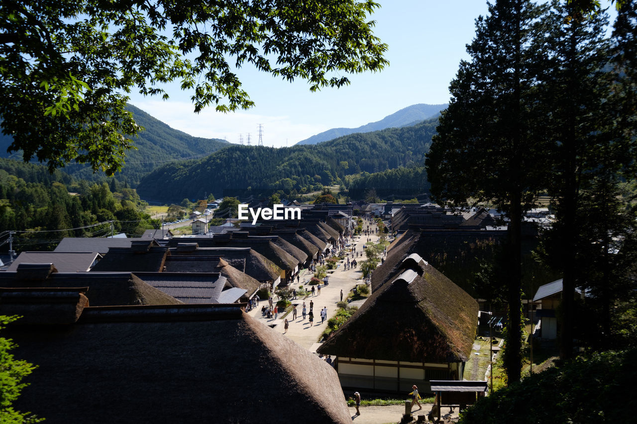 High angle view of trees and mountains against sky