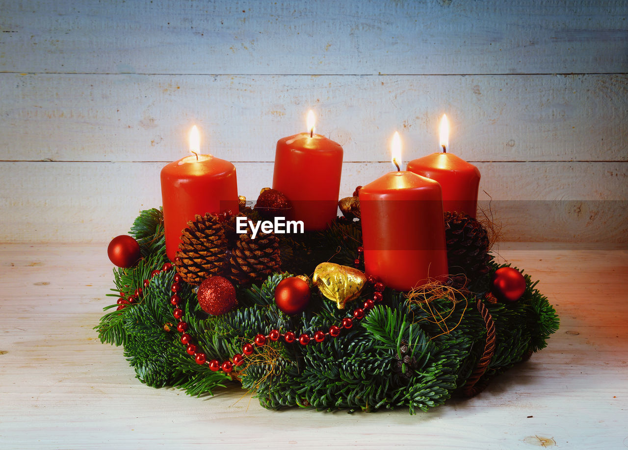 Close-up of illuminated christmas decoration on table