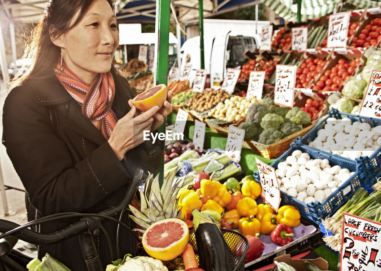 Woman shopping at local produce market