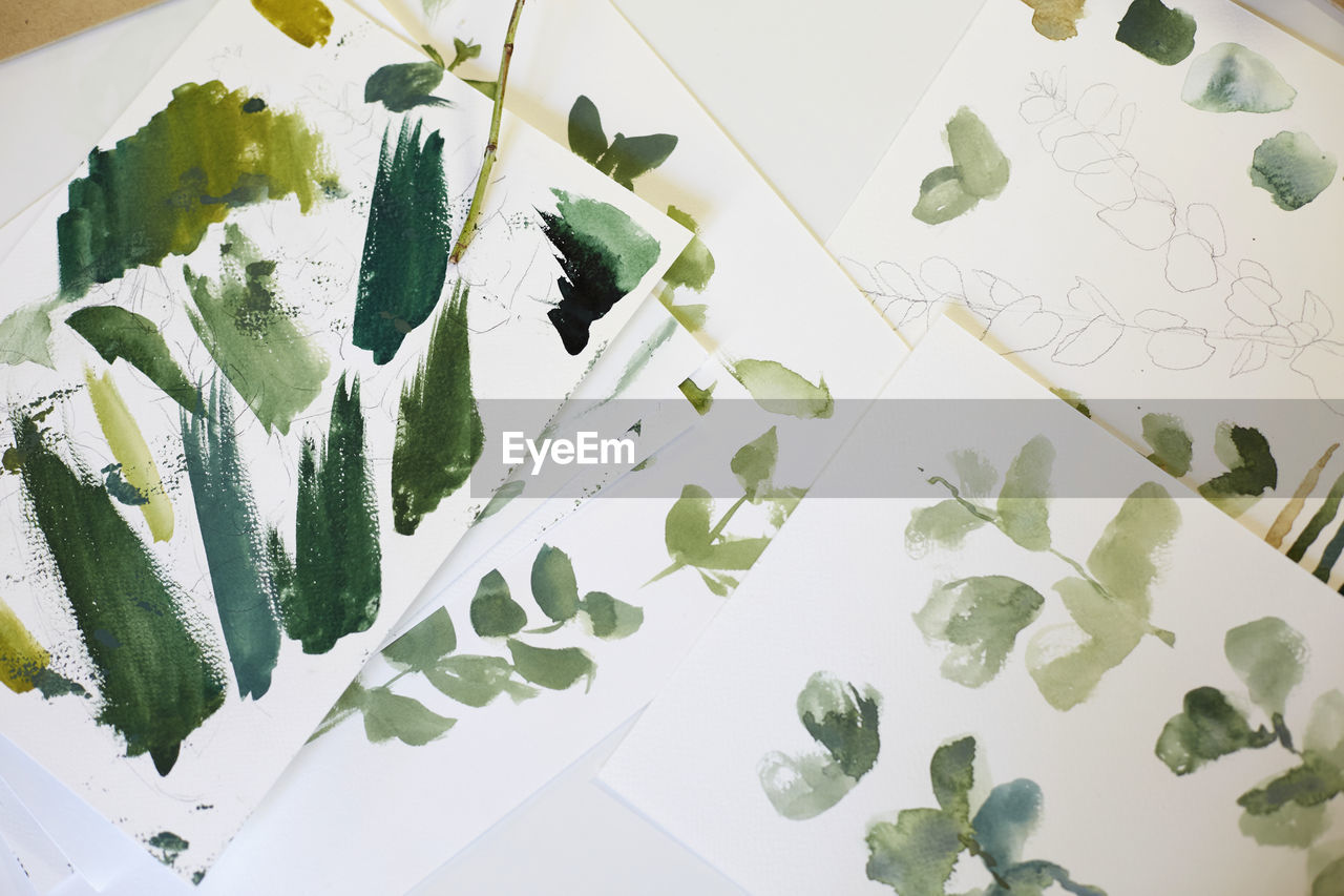 High angle view of watercolor paintings
