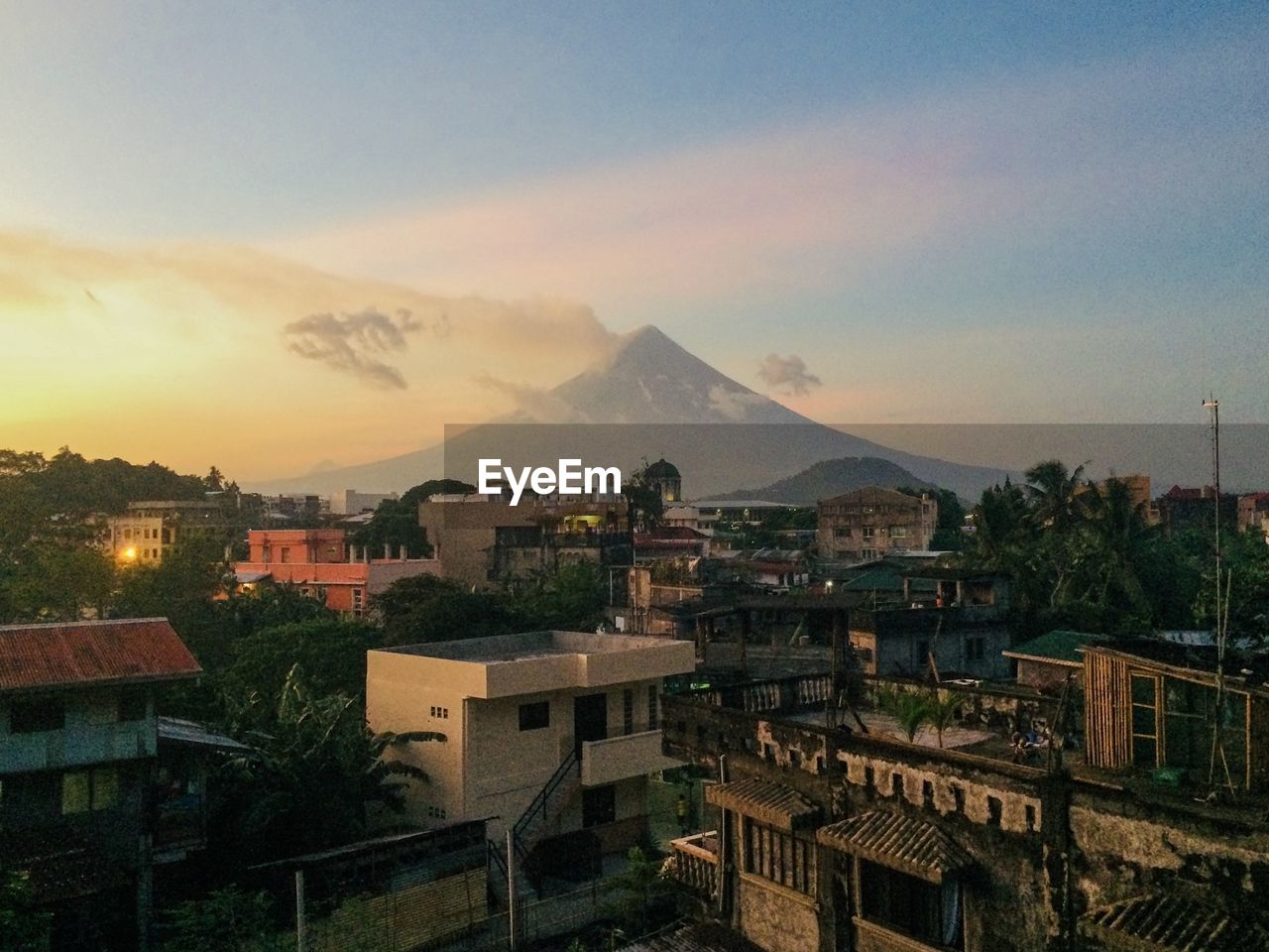 High angle view of buildings against sky during sunset