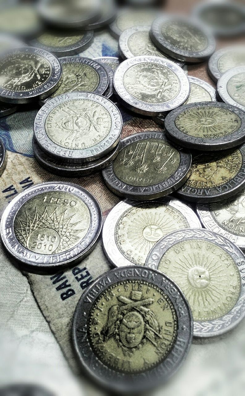 High angle view of coins on table