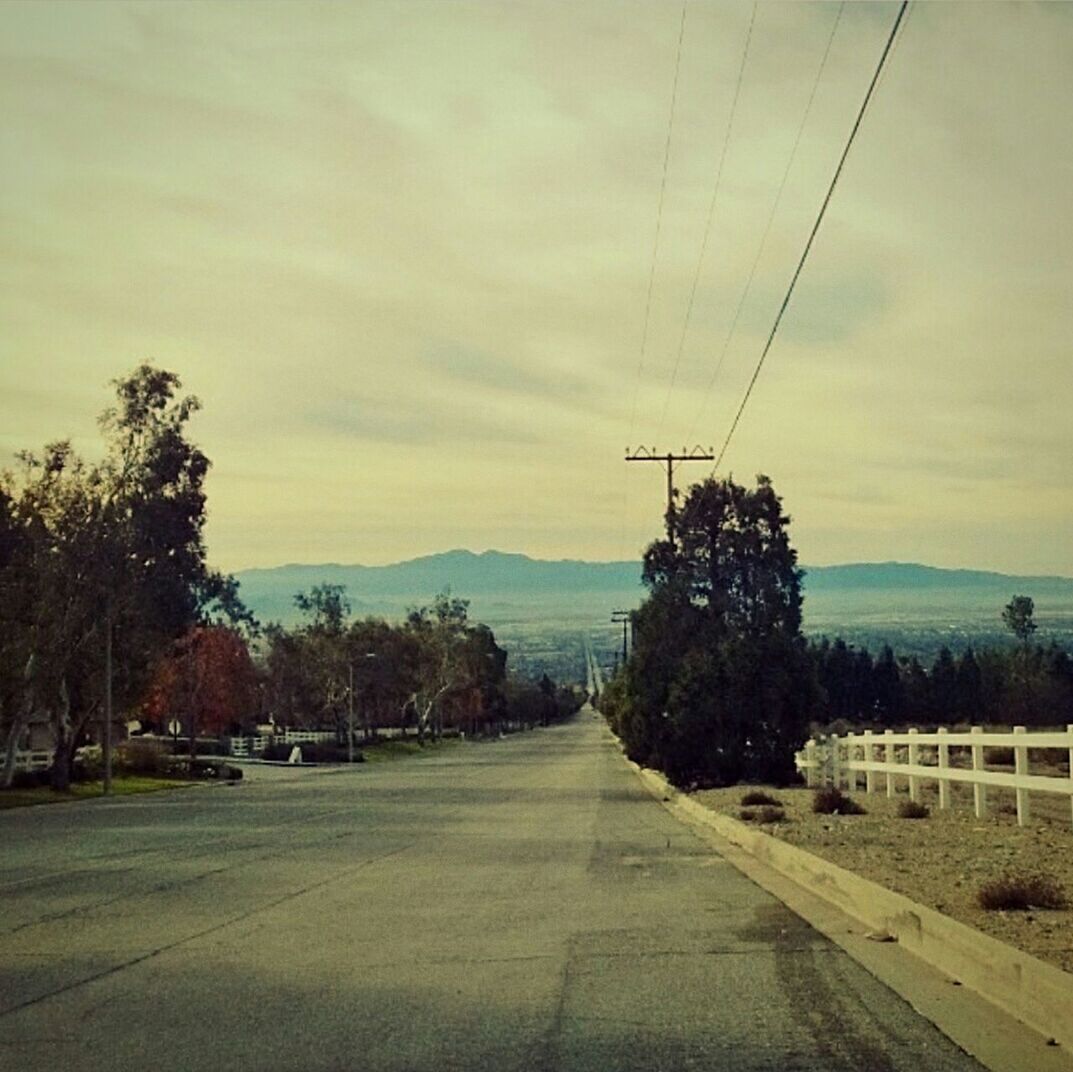 ROAD PASSING THROUGH LANDSCAPE