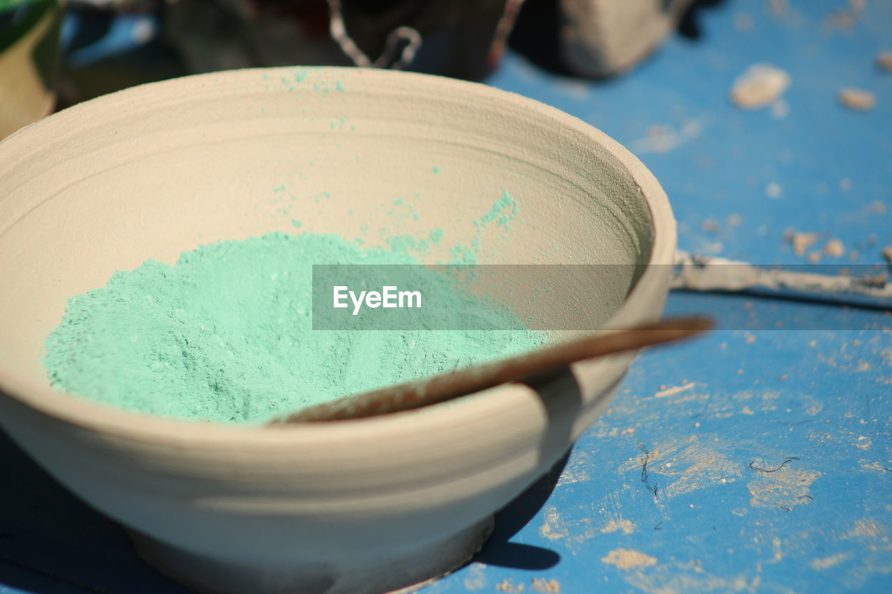 Close-up of powder paint in bowl