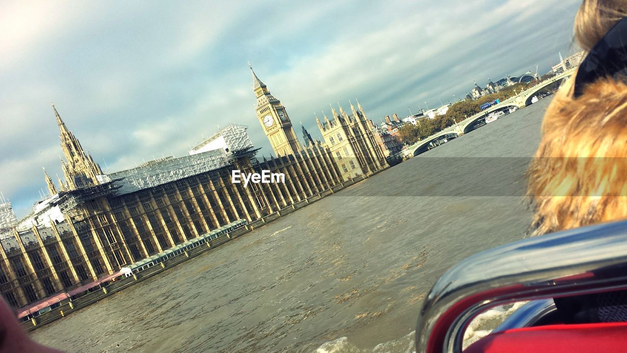 CAR AGAINST SKY IN CITY