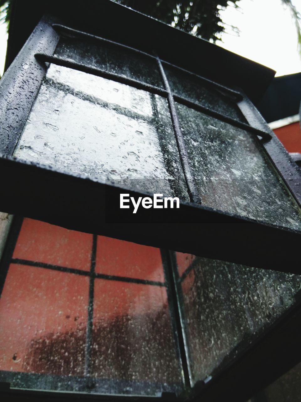 CLOSE-UP OF WET WINDOW DURING WINTER
