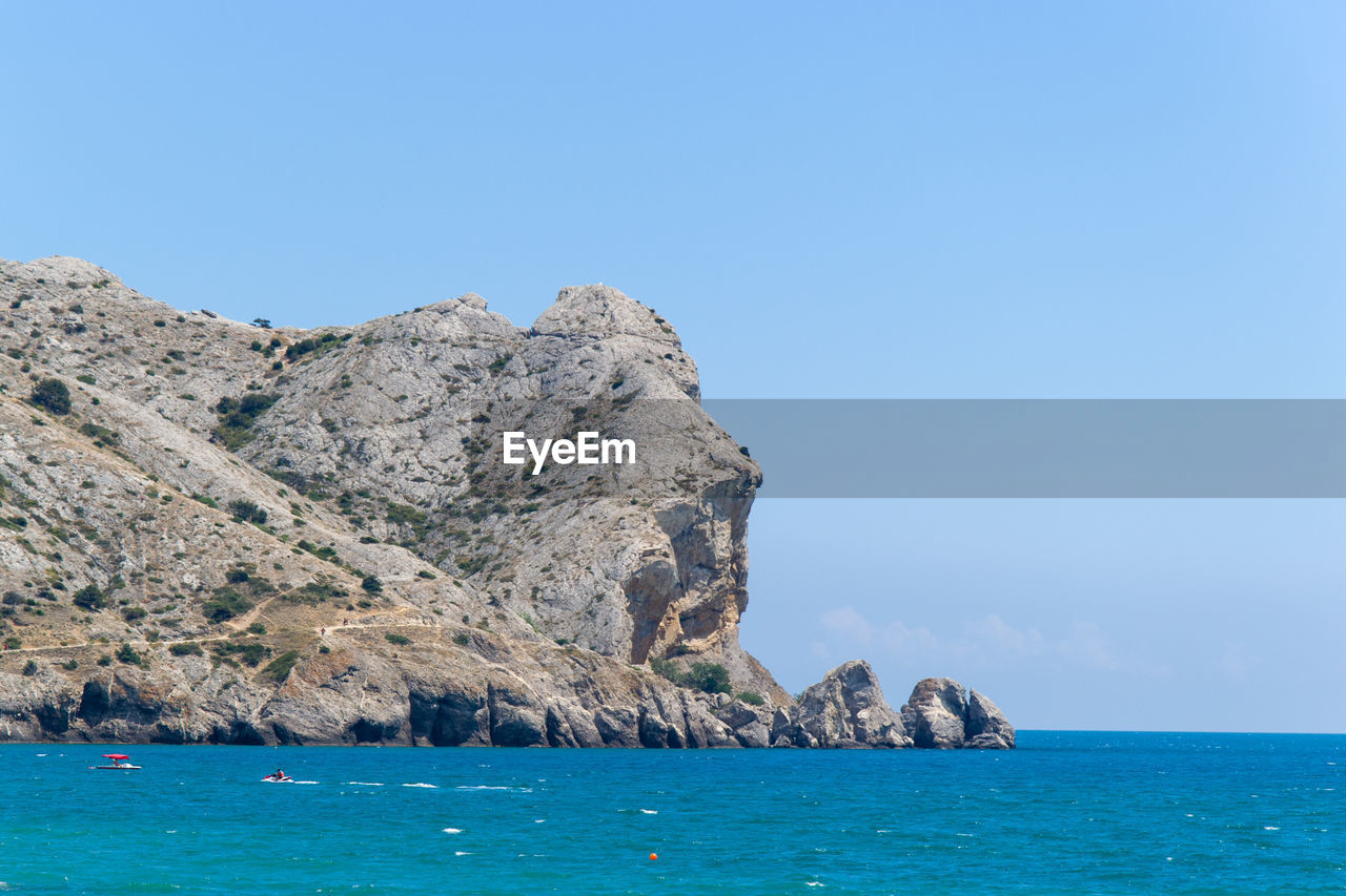 Scenic view of sea against clear sky