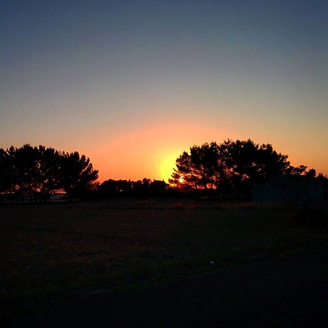 SCENIC VIEW OF SUNSET OVER LANDSCAPE