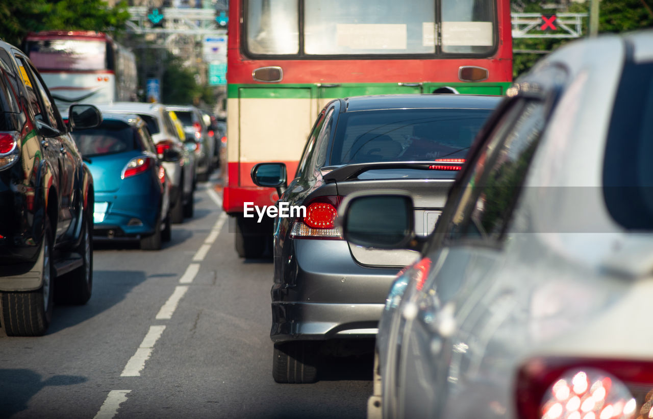 View of traffic on city street on normal work from office first day