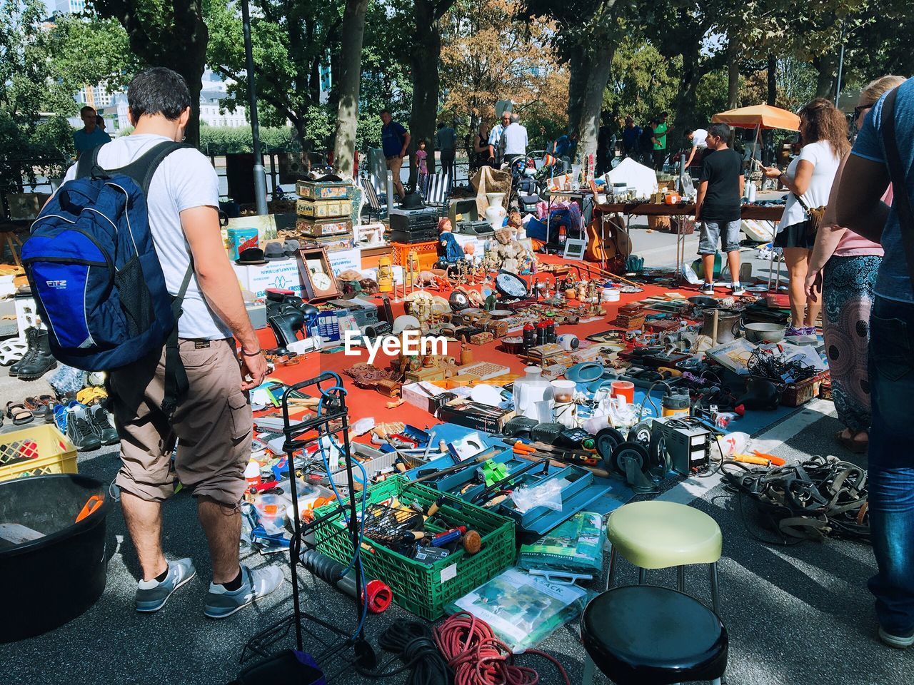 Rear view of man shopping at market