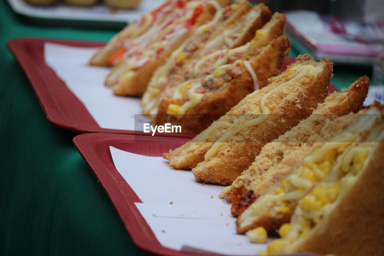 food, food and drink, fast food, fried food, meal, dish, breakfast, no people, plate, freshness, fried, indoors, close-up, cuisine, snack, selective focus, unhealthy eating, asian food, table, junk food