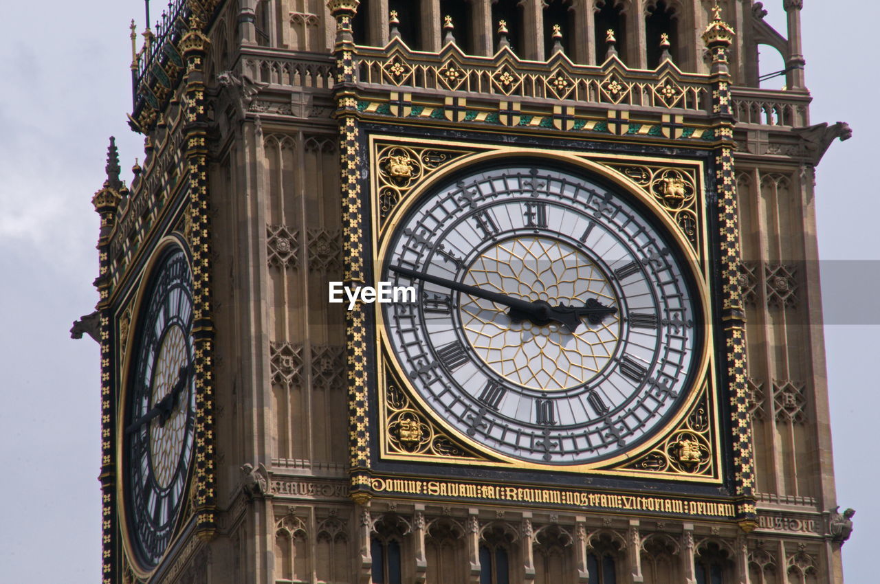 Low angle view of big ben clock face, westminster, london, united kingdom.