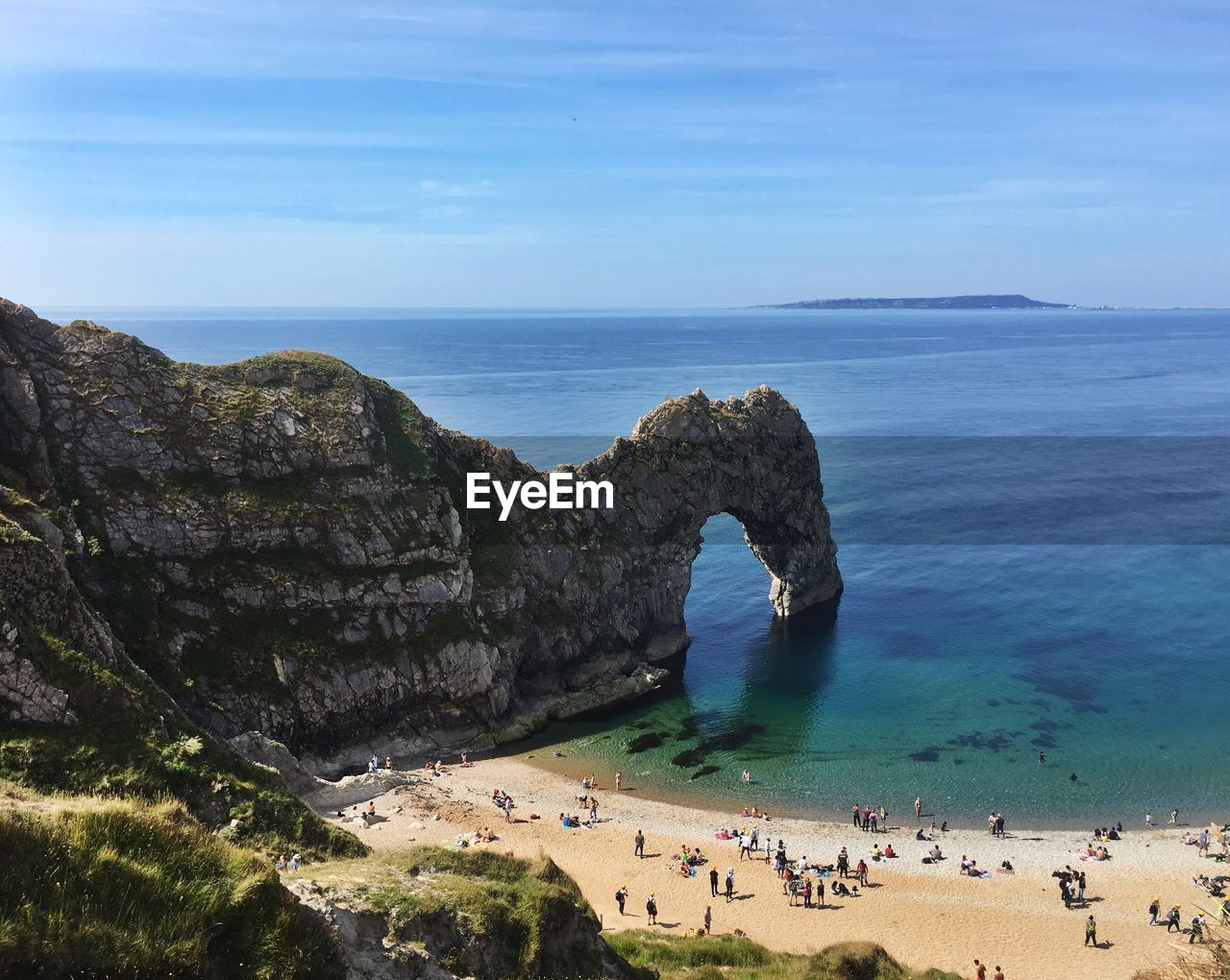 High angle view of people at beach against sky