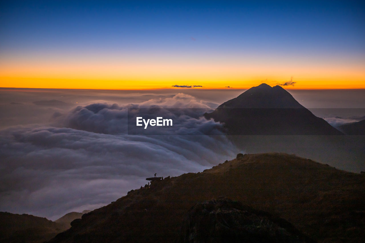 SCENIC VIEW OF CLOUDSCAPE AT SUNSET