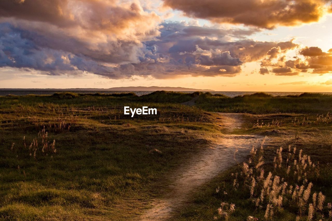 Scenic view of landscape against sky during sunset