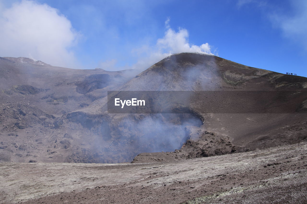 SMOKE EMITTING FROM VOLCANIC MOUNTAIN