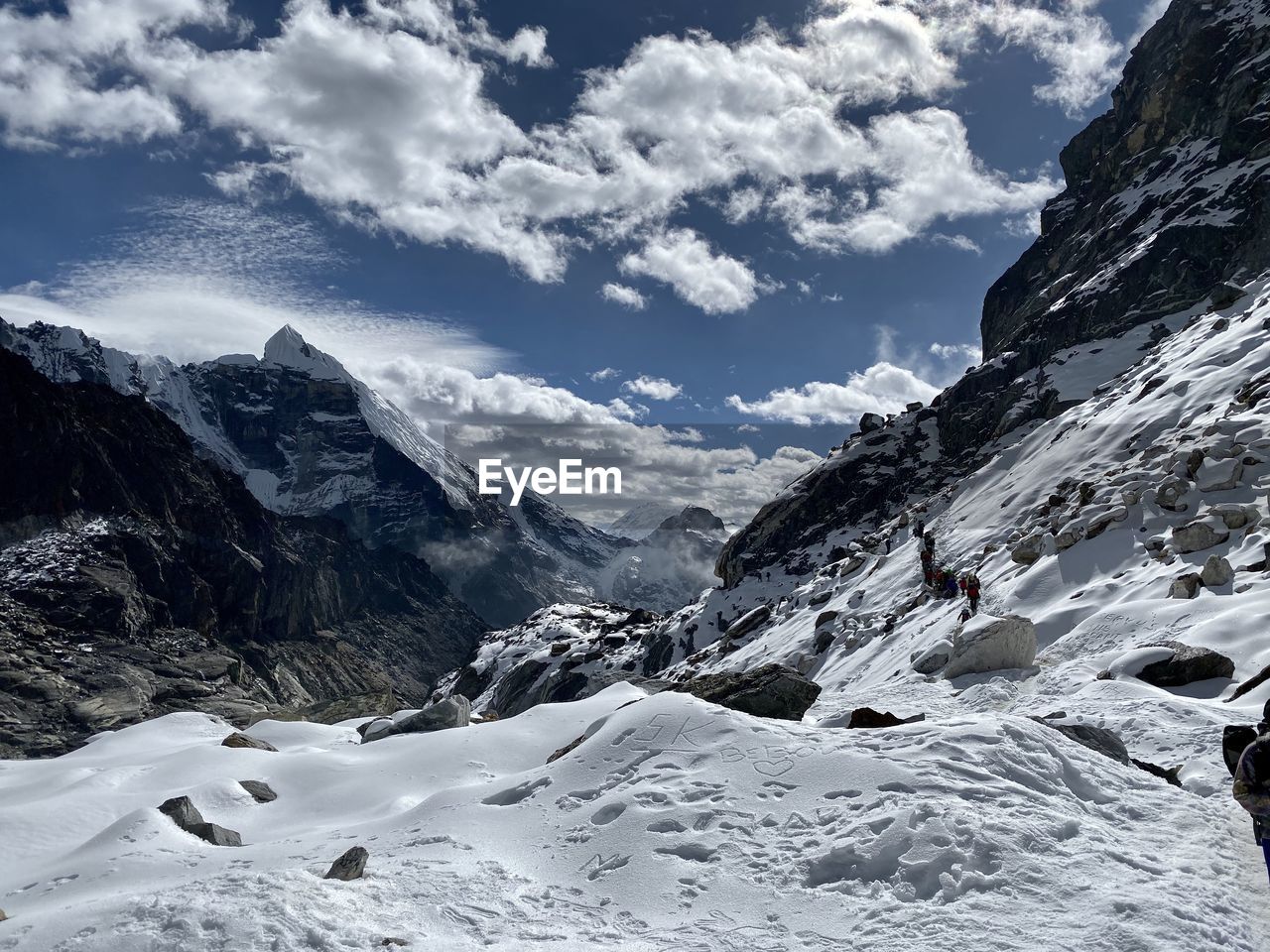 SCENIC VIEW OF SNOWCAPPED MOUNTAINS AGAINST SKY DURING WINTER