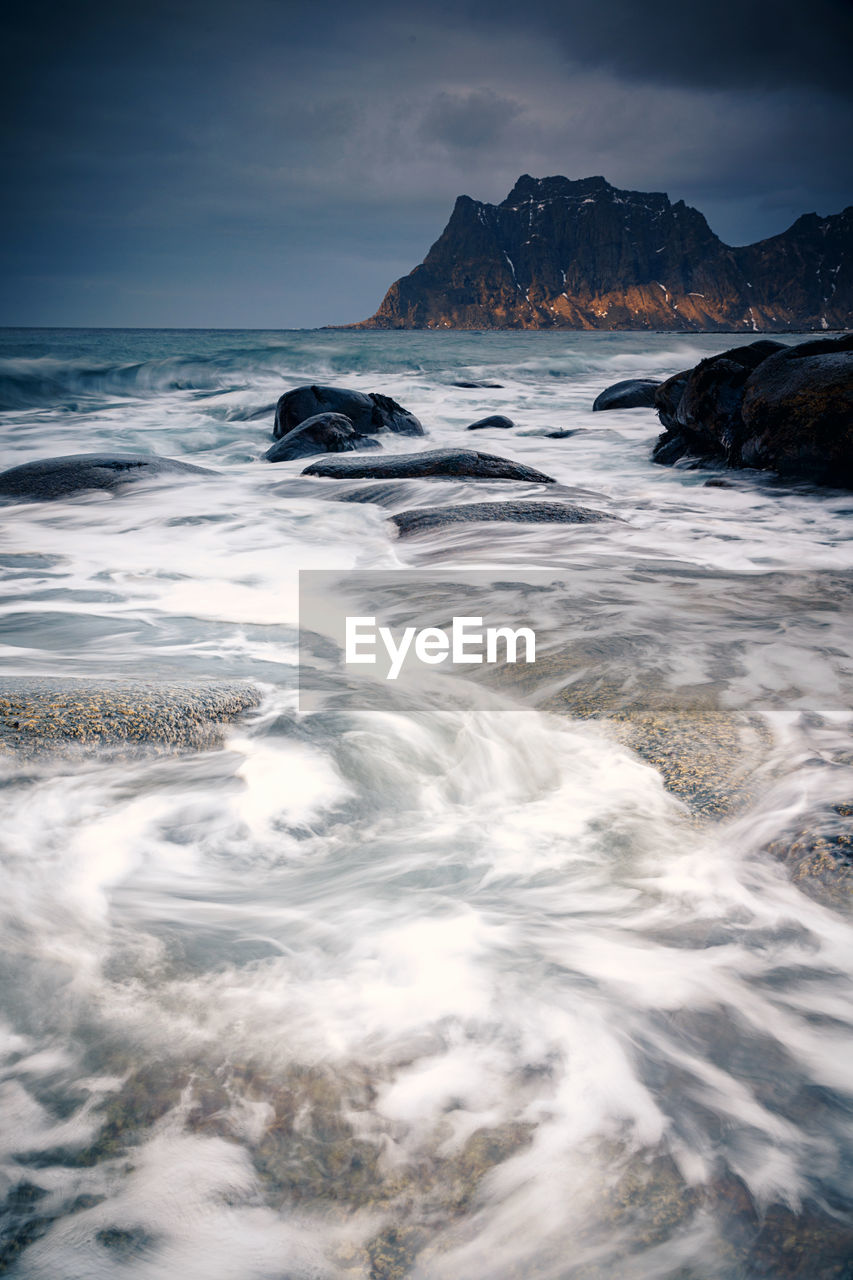 sea, water, wave, ocean, land, wind wave, scenics - nature, sky, beauty in nature, beach, motion, coast, nature, environment, shore, long exposure, cloud, body of water, rock, landscape, travel destinations, water sports, horizon, sports, no people, outdoors, seascape, coastline, travel, reflection, tranquility, tourism, cold temperature, horizon over water, night, tranquil scene, dramatic sky