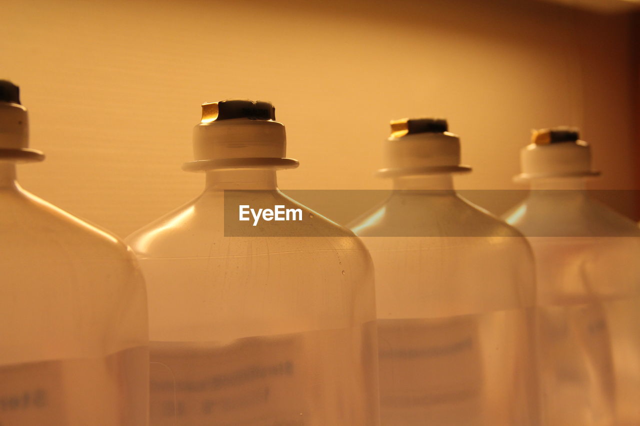 Close-up of vial bottles on table