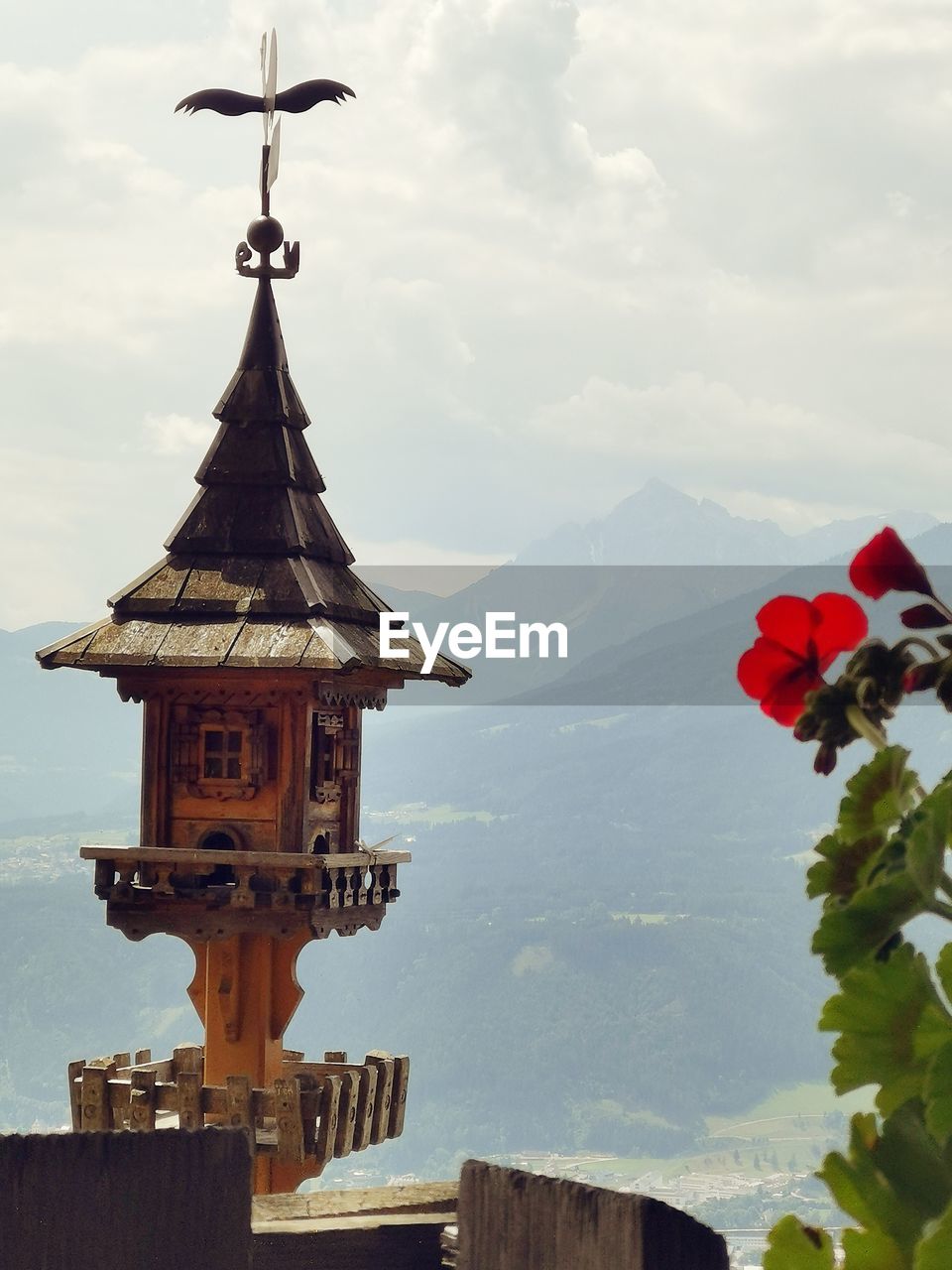 TRADITIONAL BUILDING BY WATER AGAINST SKY