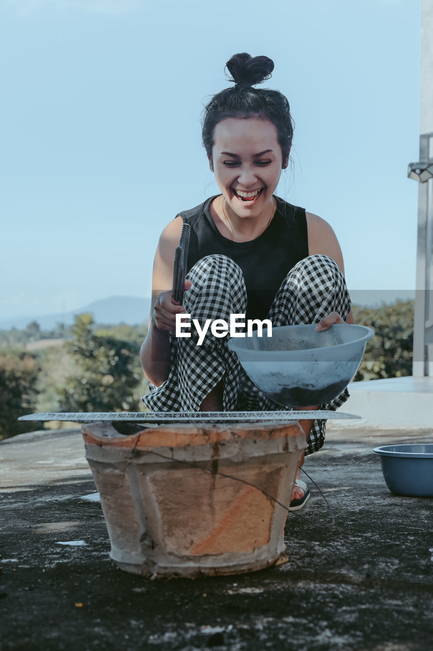 Series photo of happy young woman prepare ingredient,beef and equipment for grill a beef, roast meat