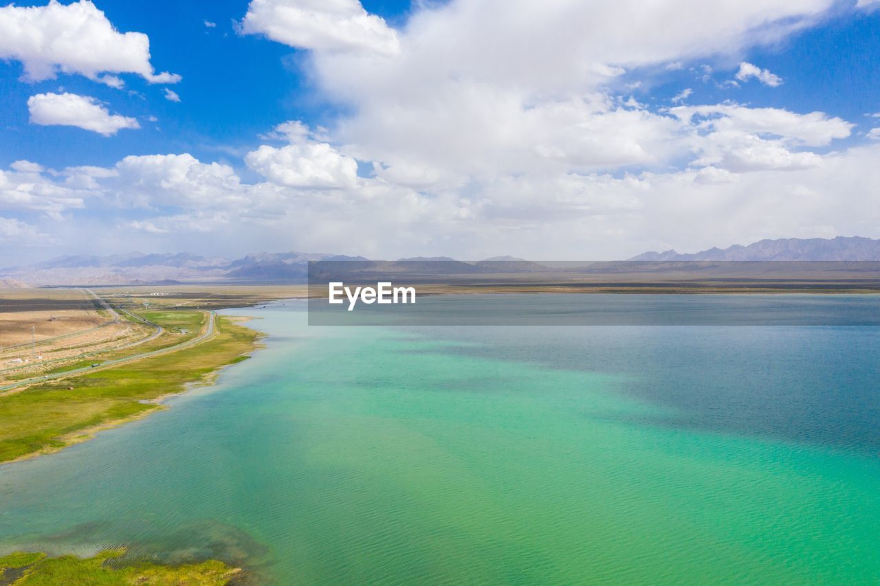 PANORAMIC SHOT OF LAKE AGAINST SKY