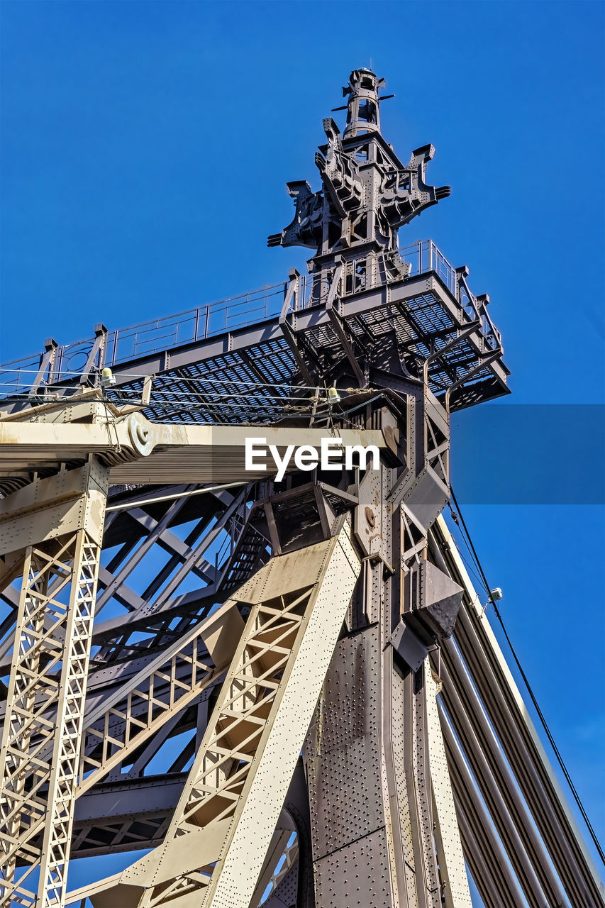 architecture, built structure, landmark, sky, blue, low angle view, clear sky, nature, building exterior, no people, tower, day, travel destinations, the past, history, sunny, outdoors, city, travel, metal, tourism, building