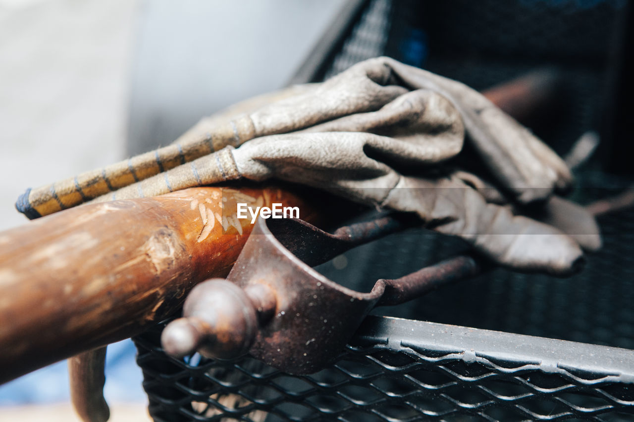 Close-up of hand holding cigarette