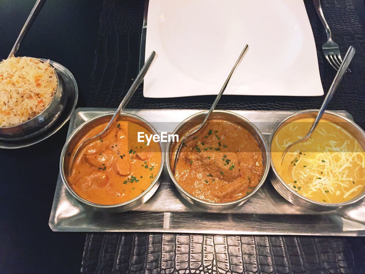 High angle view of indian food on table in restaurant