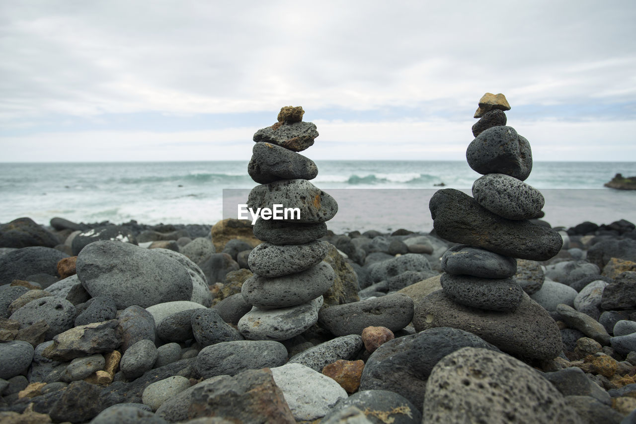 STACK OF STONES ON SHORE