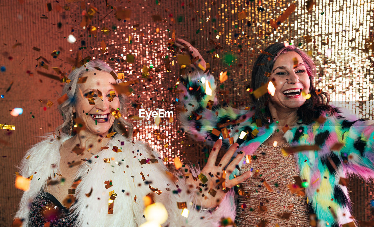 Cheerful women celebrating during party