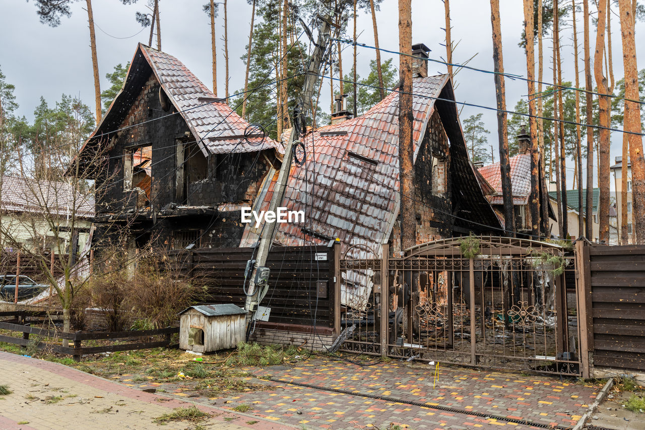 Destroyed buildings on the streets of irpen. broken windows. buildings after being hit by missiles.