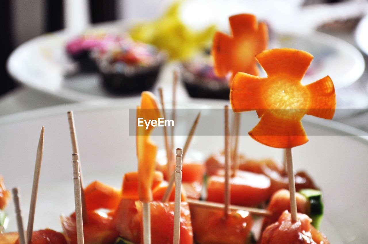 Vegetable skewers with carrot flowers