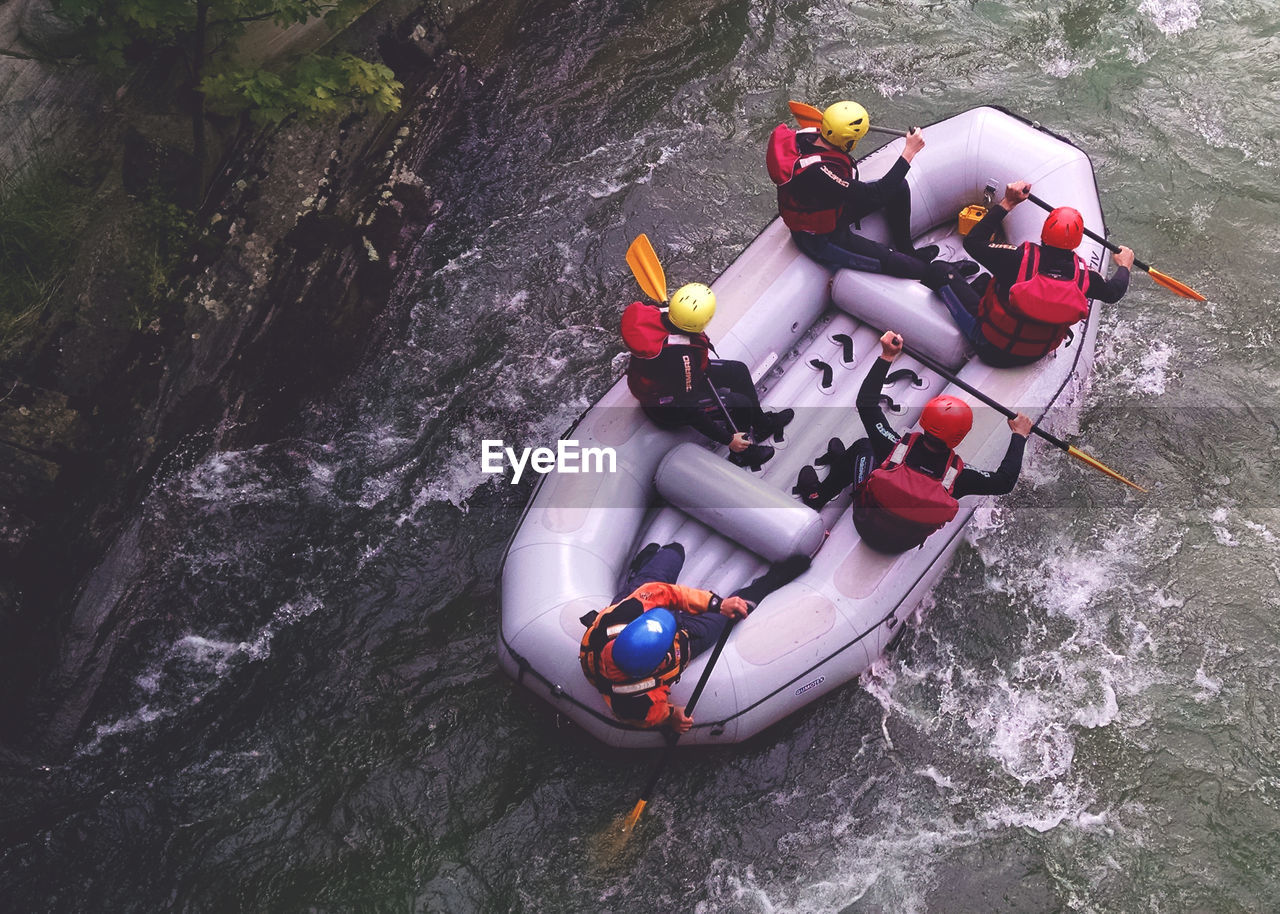 High angle view of people rafting on river