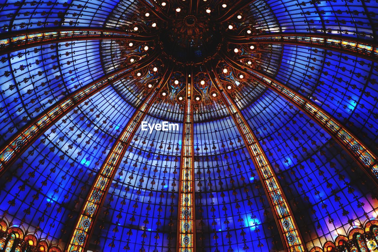 Low angle view of illuminated ceiling