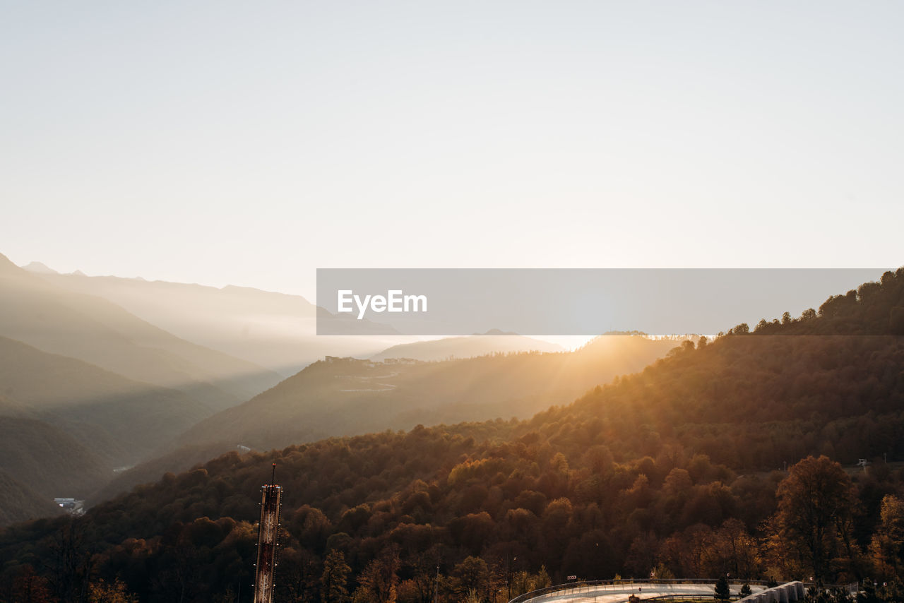 Scenic view of mountains against sky during sunset