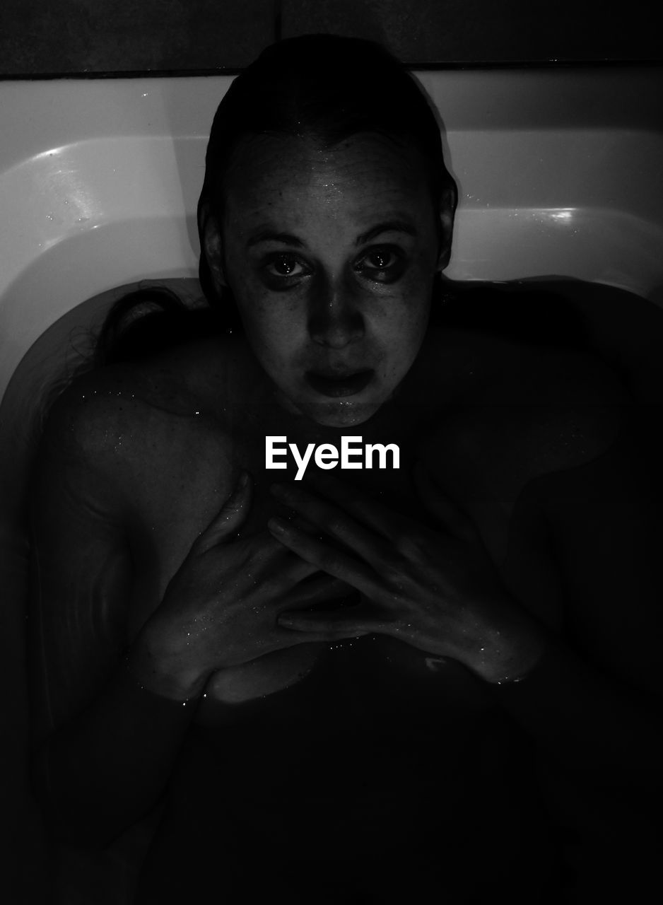 Portrait of woman in bathtub