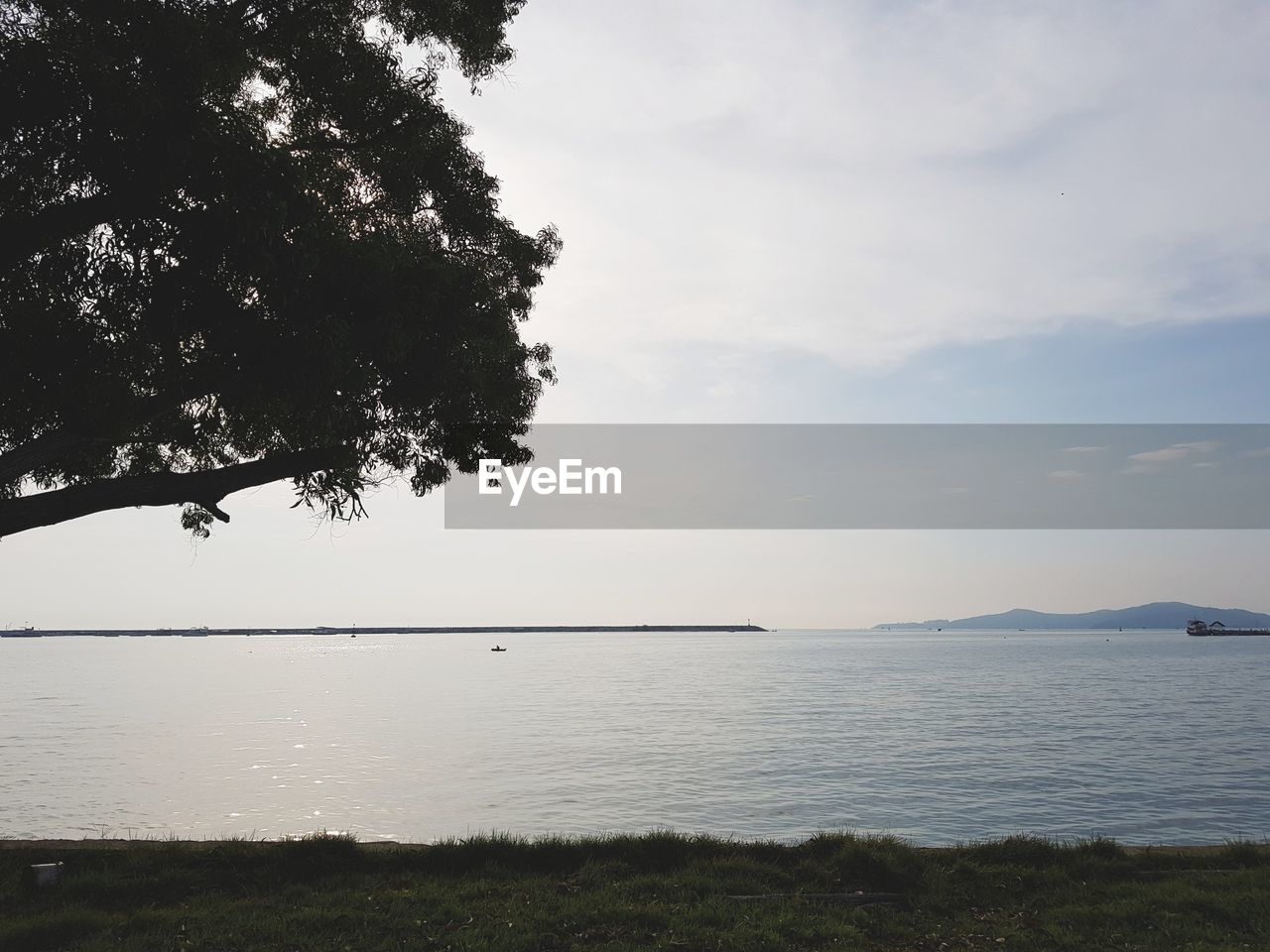 VIEW OF LAKE AGAINST SKY