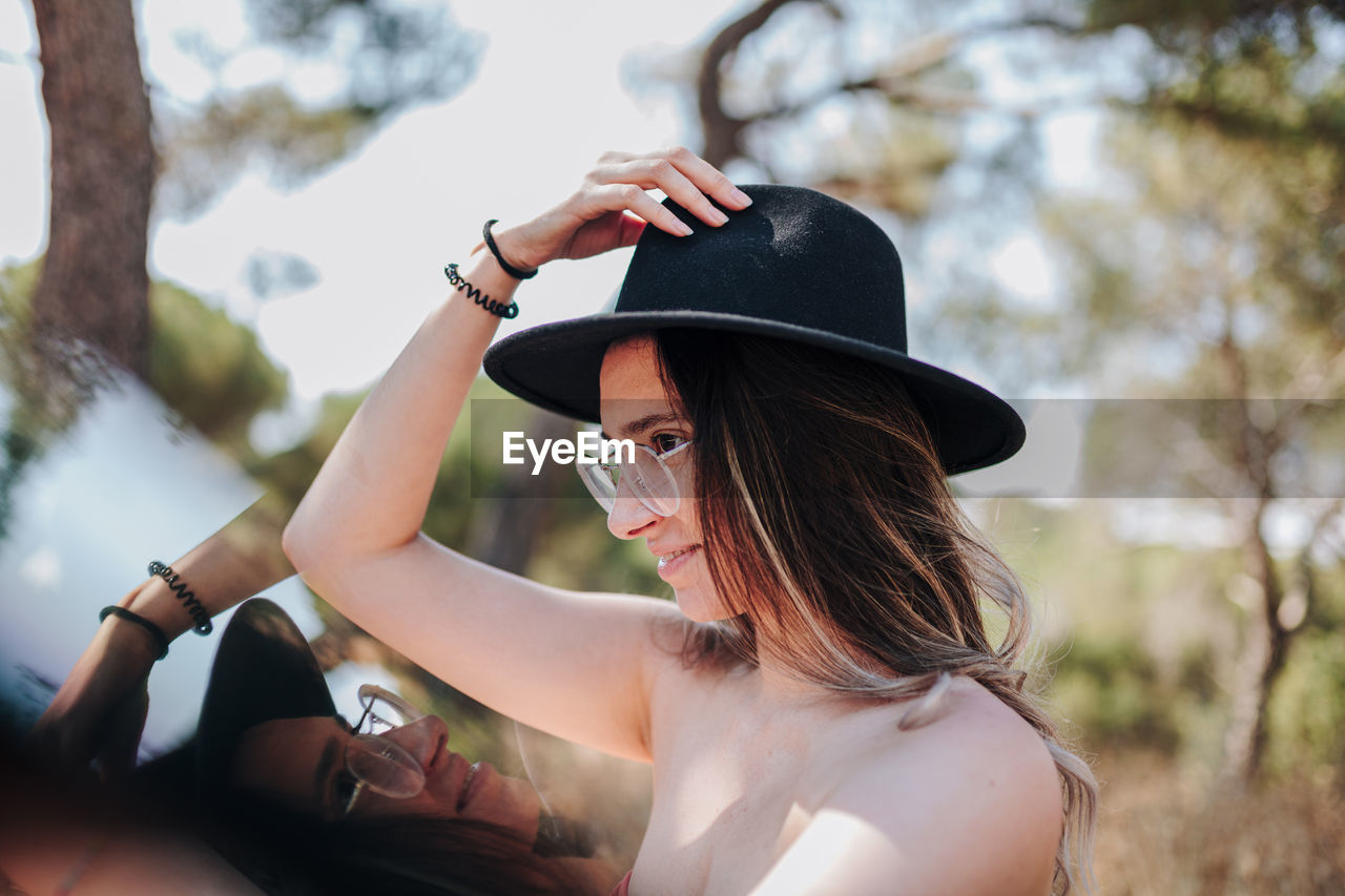 Portrait of woman wearing hat