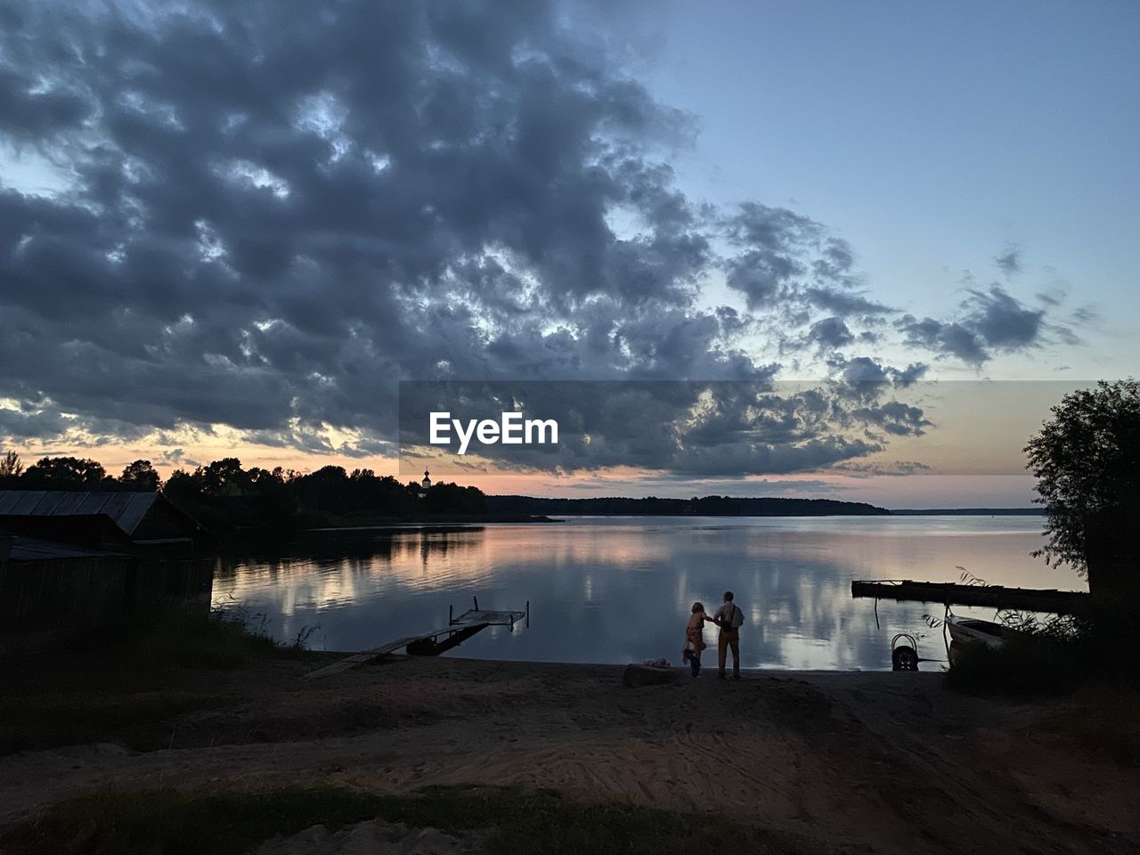 VIEW OF LAKE AGAINST SKY DURING SUNSET